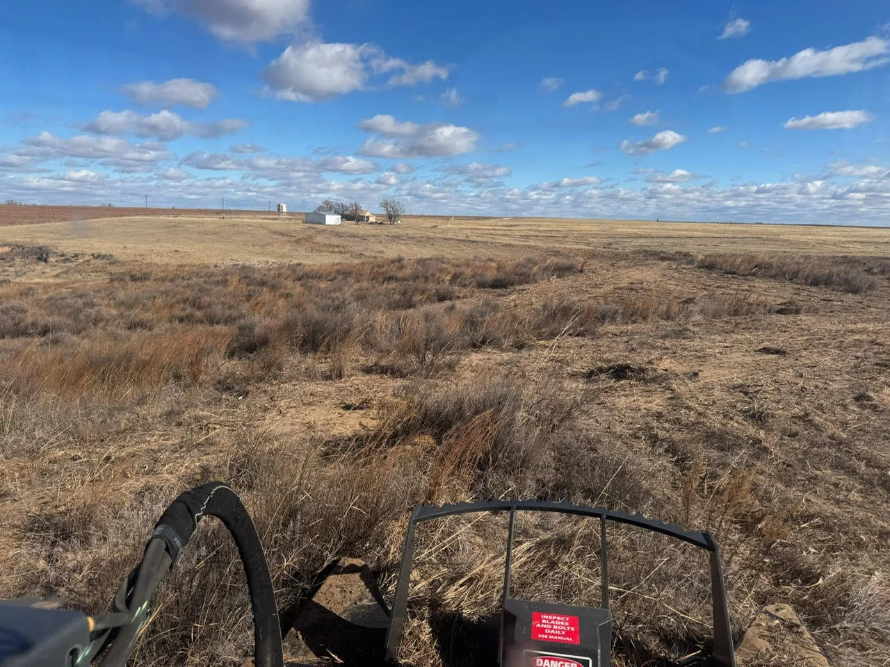 Cleared acreage with erosion control work and heavy equipment on rural Oklahoma property